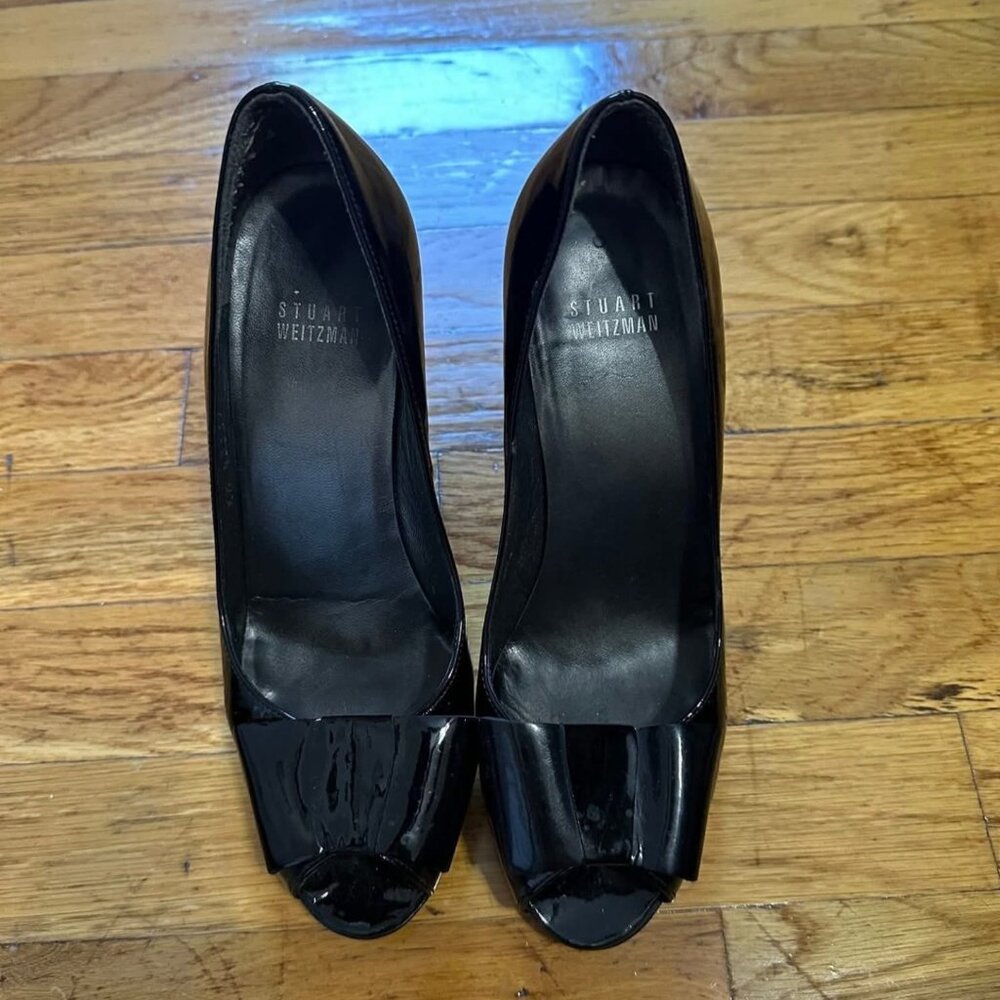 Stuart Weitzman Bowright Patent Leather Pumps.